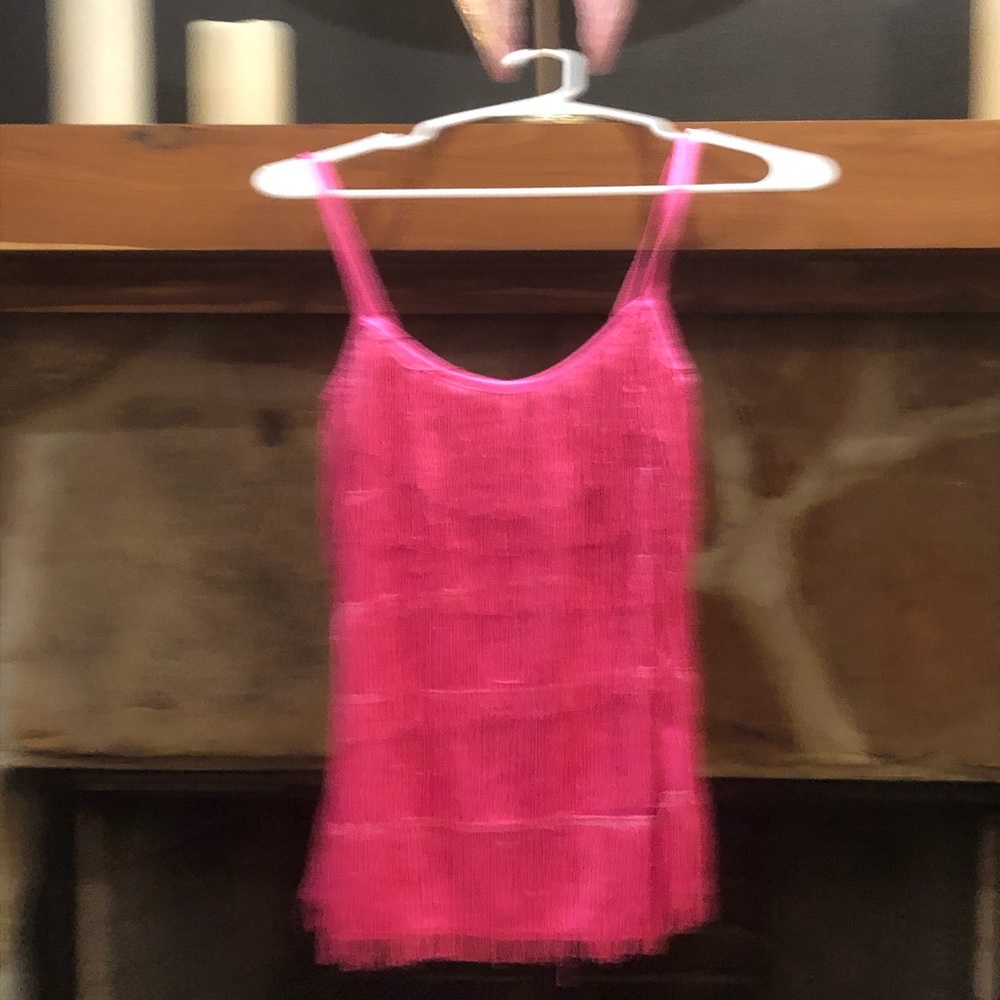 Bright pink top.